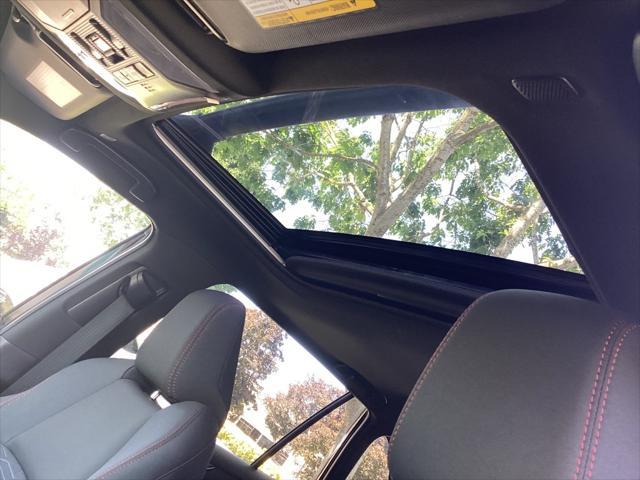 Photo of 2025 Midnight Black Metallic Toyota RAV4 Hybrid
