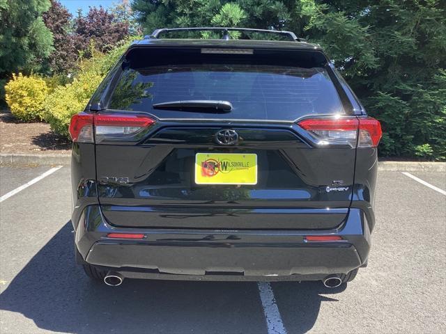 Photo of 2025 Midnight Black Metallic Toyota RAV4 Hybrid