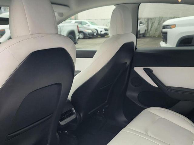 Photo of 2022 Pearl White Multi-Coat Tesla Model Y