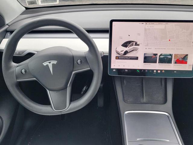 Photo of 2022 Pearl White Multi-Coat Tesla Model Y