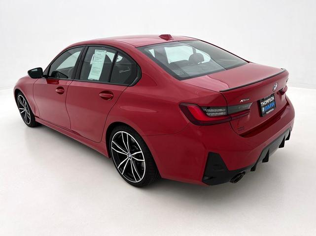Photo of 2023 Melbourne Red Metallic BMW 330