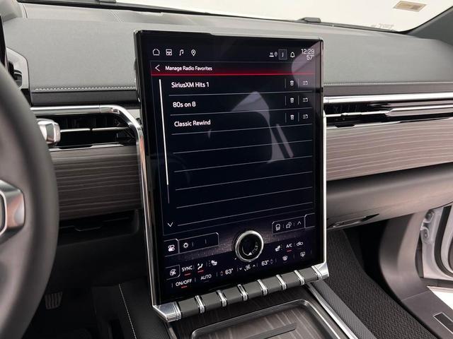 Photo of 2025 Summit White GMC Sierra EV
