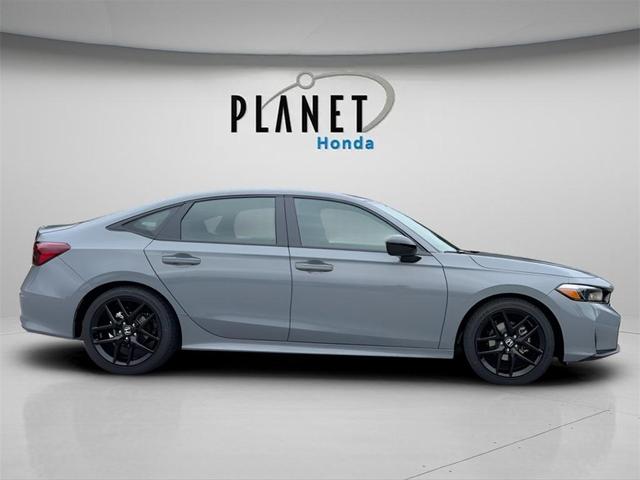 Photo of 2026 Boost Blue Pearl Honda Civic Hybrid