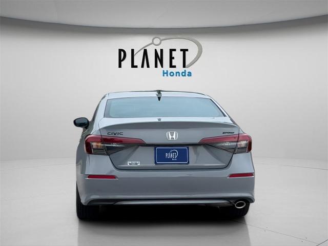 Photo of 2026 Boost Blue Pearl Honda Civic Hybrid