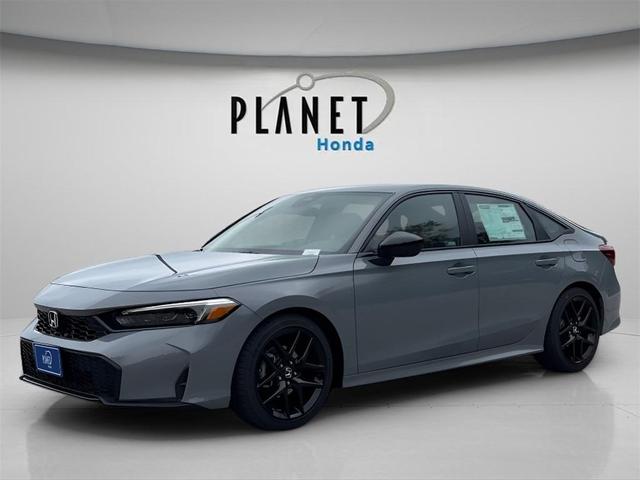 Photo of 2026 Boost Blue Pearl Honda Civic Hybrid