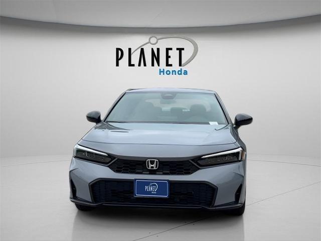 Photo of 2026 Boost Blue Pearl Honda Civic Hybrid
