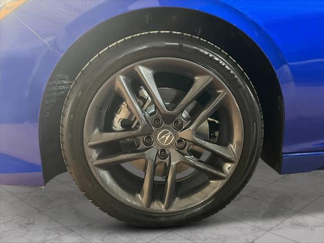 Photo of 2025 Apex Blue Pearl Acura TLX