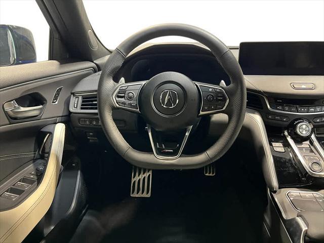 Photo of 2025 Apex Blue Pearl Acura TLX