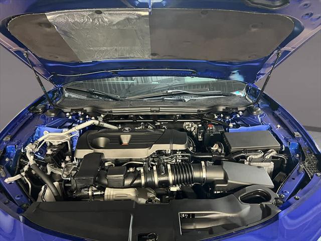 Photo of 2025 Apex Blue Pearl Acura TLX