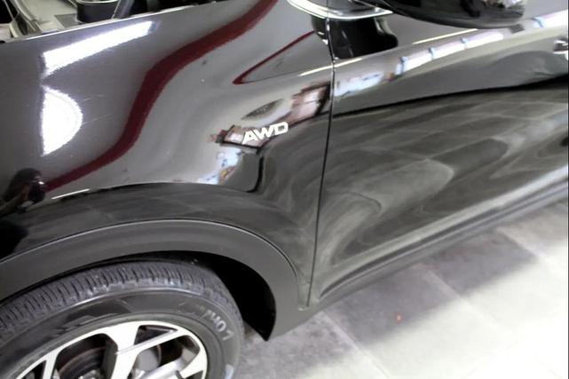 Photo of 2022 Black Cherry Kia Sportage