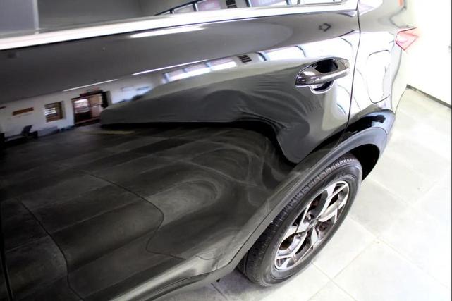 Photo of 2022 Black Cherry Kia Sportage