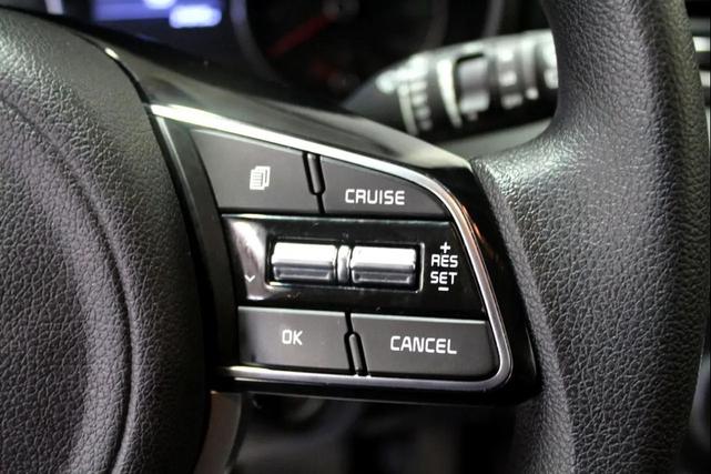 Photo of 2022 Black Cherry Kia Sportage