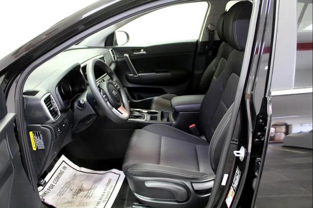 Photo of 2022 Black Cherry Kia Sportage