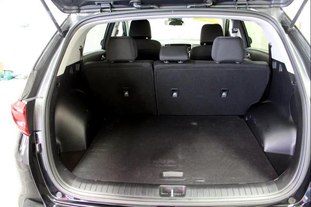 Photo of 2022 Black Cherry Kia Sportage