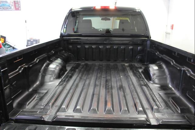 Photo of 2015 Super Black Nissan Frontier