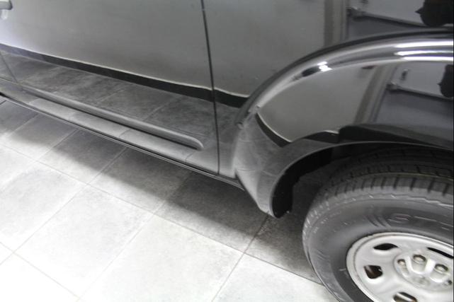 Photo of 2015 Super Black Nissan Frontier