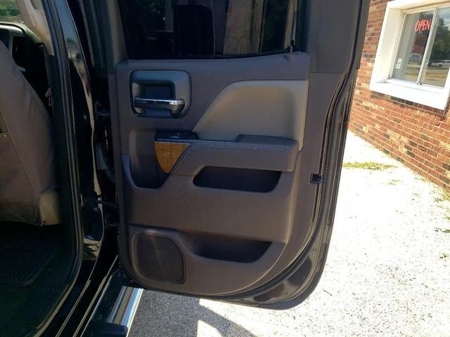 Photo of 2016 Black GMC Sierra 1500