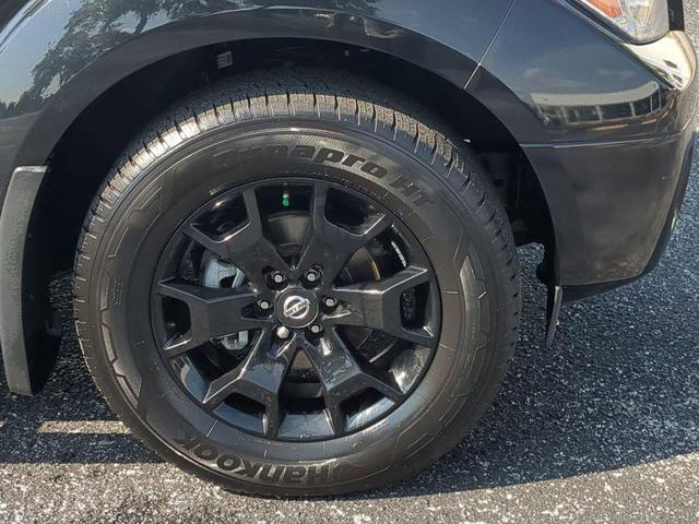 Photo of 2021 Magnetic Black Pearl Nissan Frontier