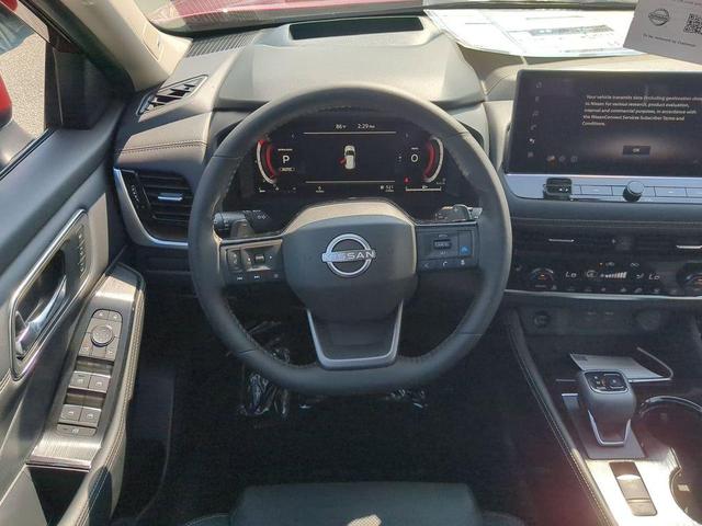 Photo of 2025 Scarlet Ember Tintcoat Nissan Rogue