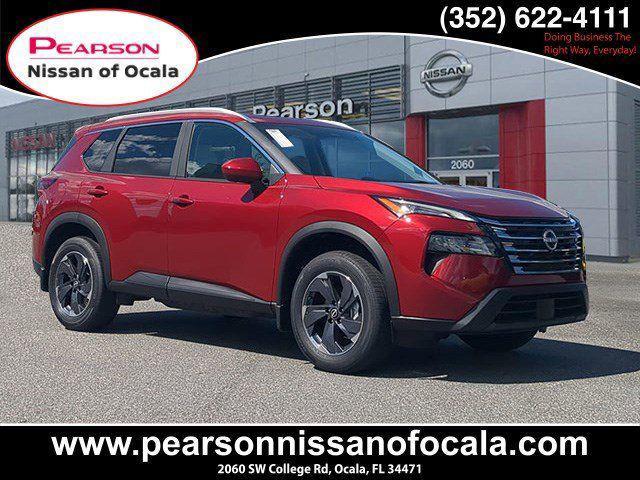 Photo of 2026 Scarlet Ember Tintcoat Nissan Rogue