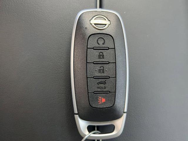 Photo of 2026 Scarlet Ember Tintcoat Nissan Rogue