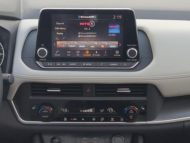 Photo of 2026 Scarlet Ember Tintcoat Nissan Rogue