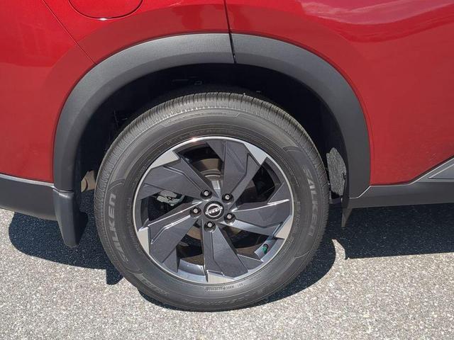 Photo of 2026 Scarlet Ember Tintcoat Nissan Rogue
