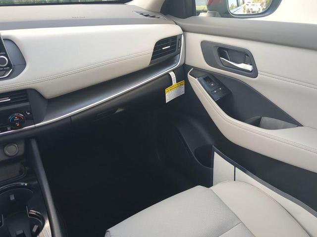 Photo of 2026 Scarlet Ember Tintcoat Nissan Rogue