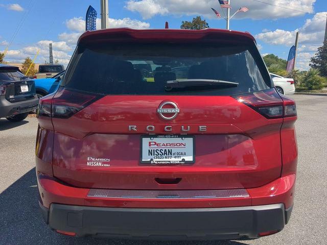 Photo of 2026 Scarlet Ember Tintcoat Nissan Rogue