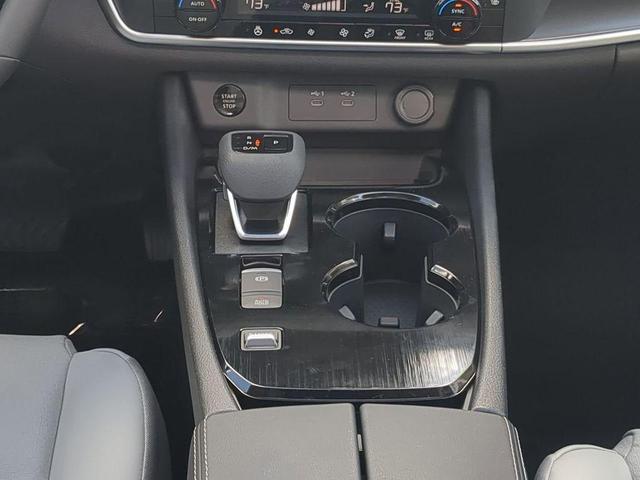 Photo of 2026 Scarlet Ember Tintcoat Nissan Rogue