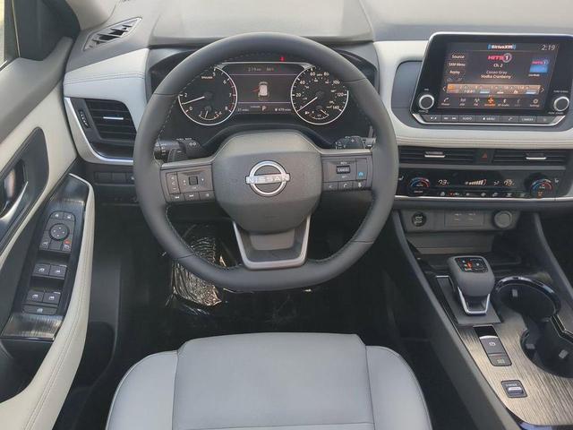 Photo of 2026 Scarlet Ember Tintcoat Nissan Rogue