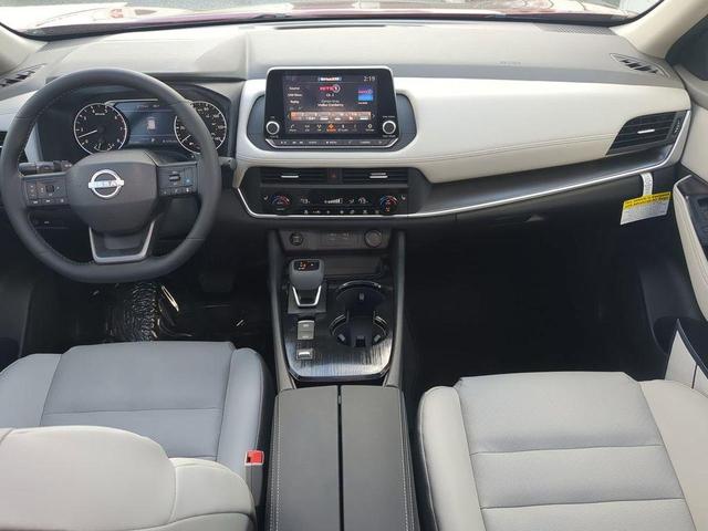 Photo of 2026 Scarlet Ember Tintcoat Nissan Rogue