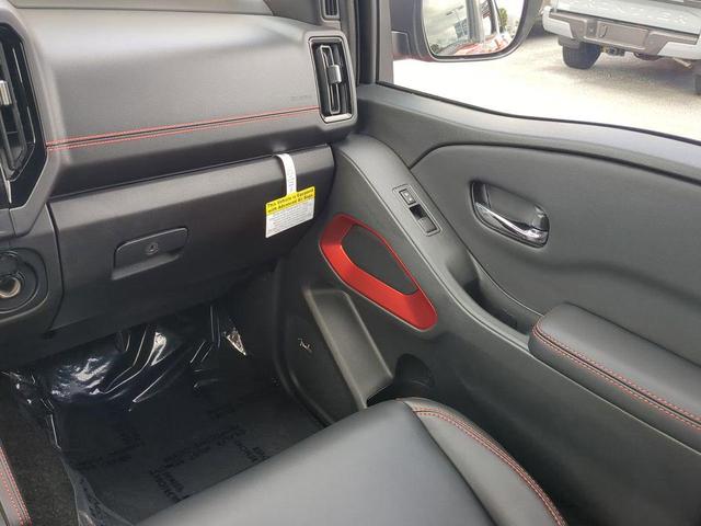 Photo of 2025 Afterburn Orange Nissan Frontier