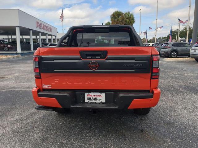 Photo of 2025 Afterburn Orange Nissan Frontier