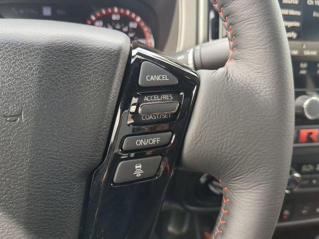 Photo of 2025 Afterburn Orange Nissan Frontier