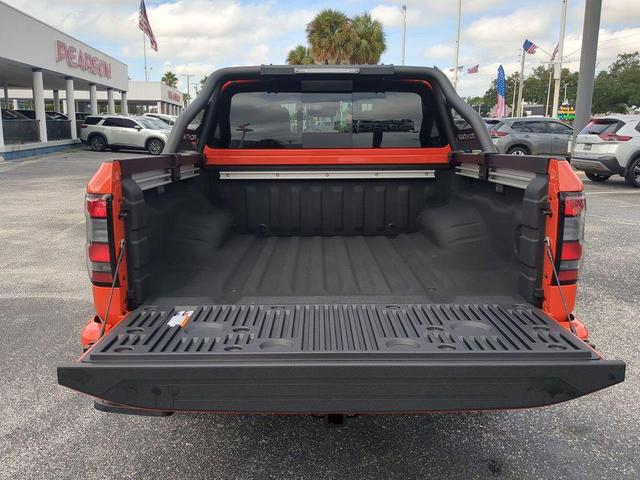 Photo of 2025 Afterburn Orange Nissan Frontier