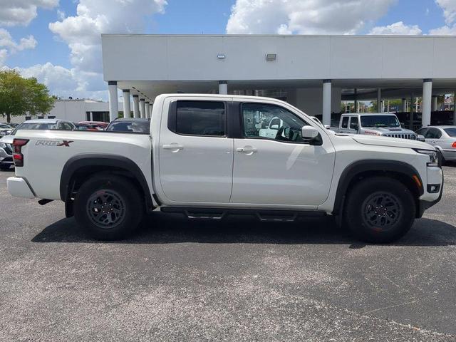 Photo of 2025 Glacier White Nissan Frontier