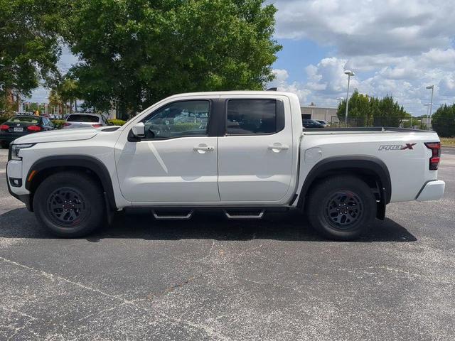 Photo of 2025 Glacier White Nissan Frontier