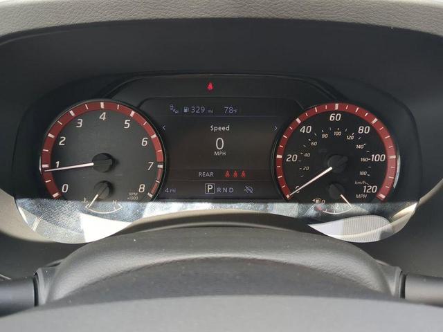 Photo of 2025 Glacier White Nissan Frontier