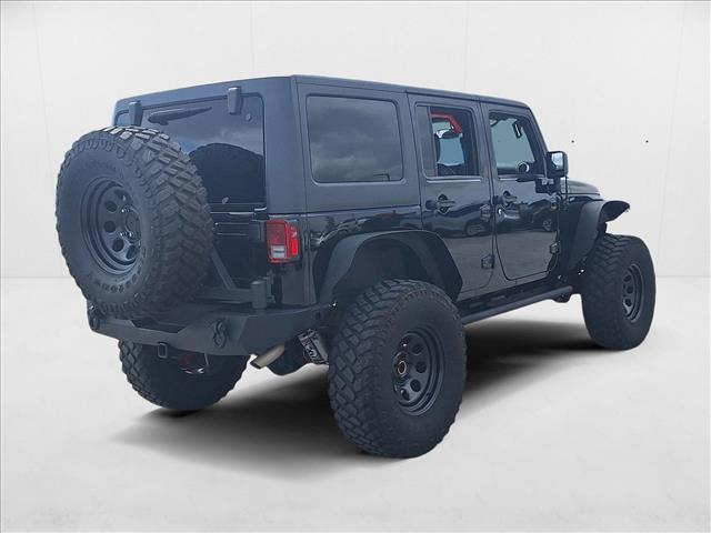 Photo of 2015 Black Clearcoat Jeep Wrangler Unlimited