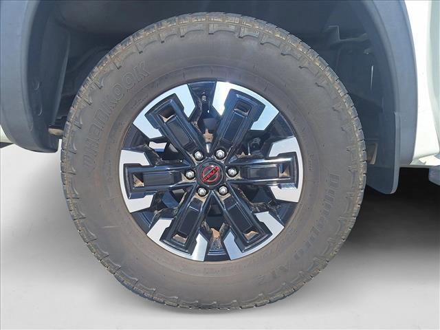 Photo of 2022 Glacier White Nissan Frontier
