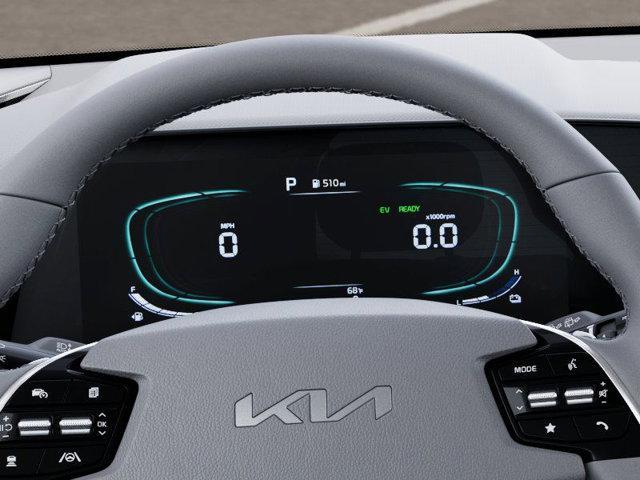Photo of 2025 Cityscape Green Kia Niro