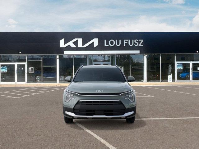 Photo of 2025 Cityscape Green Kia Niro