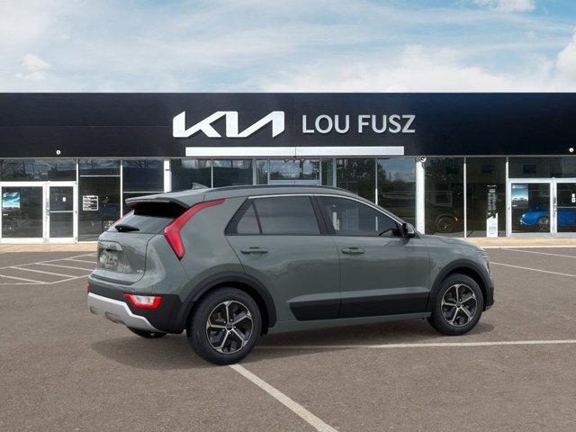 Photo of 2025 Cityscape Green Kia Niro