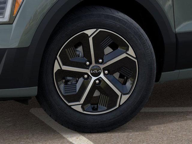 Photo of 2025 Cityscape Green Kia Niro