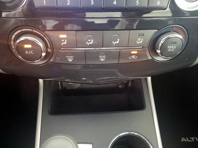 Photo of 2015 Burgundy Nissan Altima