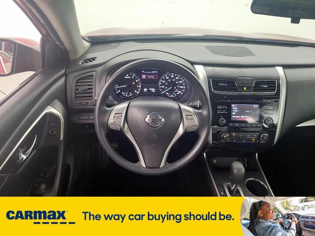 Photo of 2015 Burgundy Nissan Altima