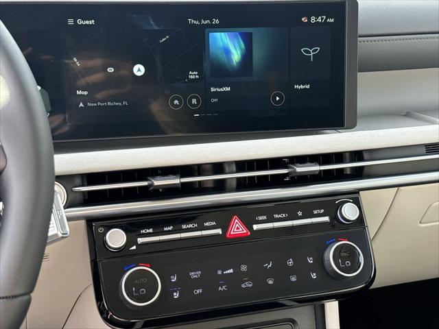 Photo of 2025 Titan Gray Hyundai TUCSON Hybrid