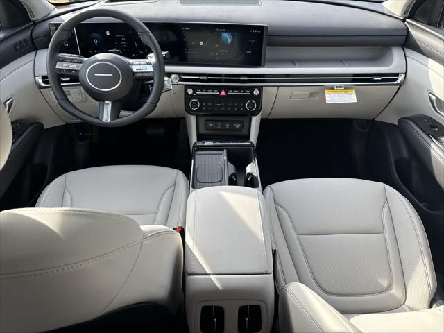 Photo of 2025 Titan Gray Hyundai TUCSON Hybrid