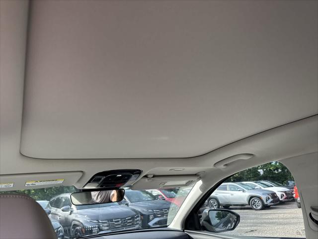 Photo of 2025 Titan Gray Hyundai TUCSON Hybrid